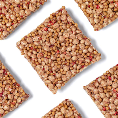 Square bēgood nutrition bars with a textured surface on a white background